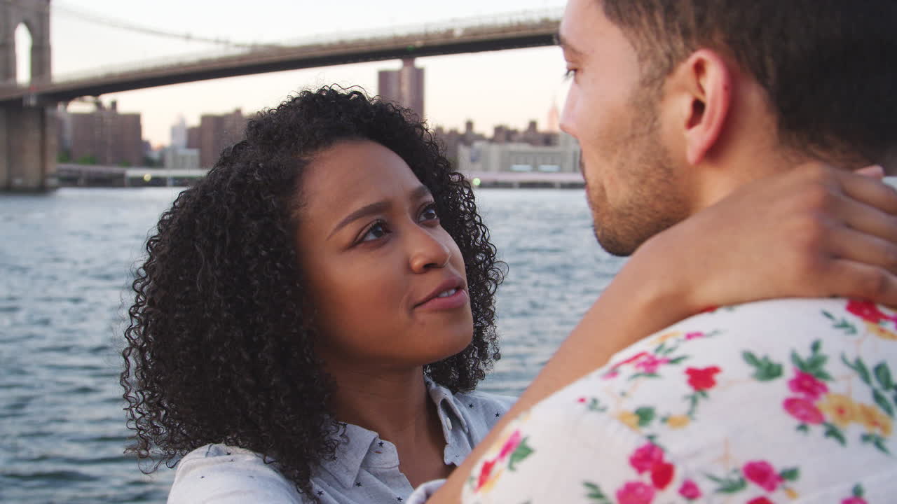 Romantic Young Couple With Manhattan Skyline In Background