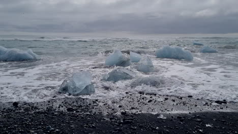 nice shot of fragments of icebergs found on the shore of diamond beach