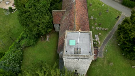 A-push-in-shot-over-the-tower-and-roof-of-St-Margaret-of-Antioch-church-in-Womenswold