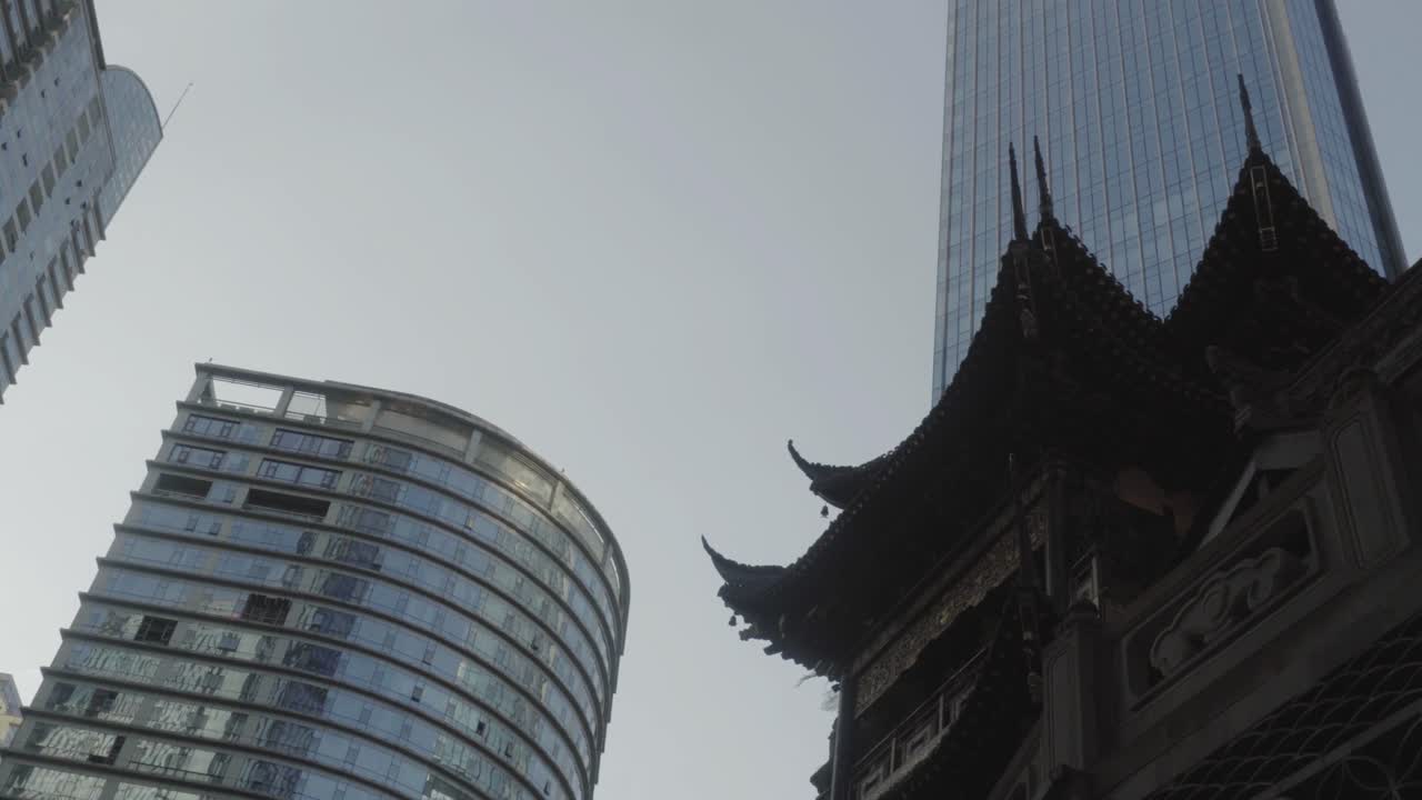 a striking contrast between modern and traditional architecture