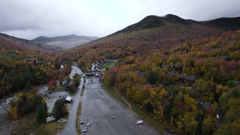 loon mountain resort during fall in new hampshire, aerial flyover