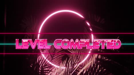 Animation-of-level-completed-text-in-shiny-pink-and-ring-in-pink-neon,-over-palm-leaves-on-black