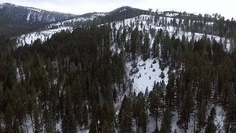 AERIAL---A-snow-covered-mountainside-display's-Montana's-beauty