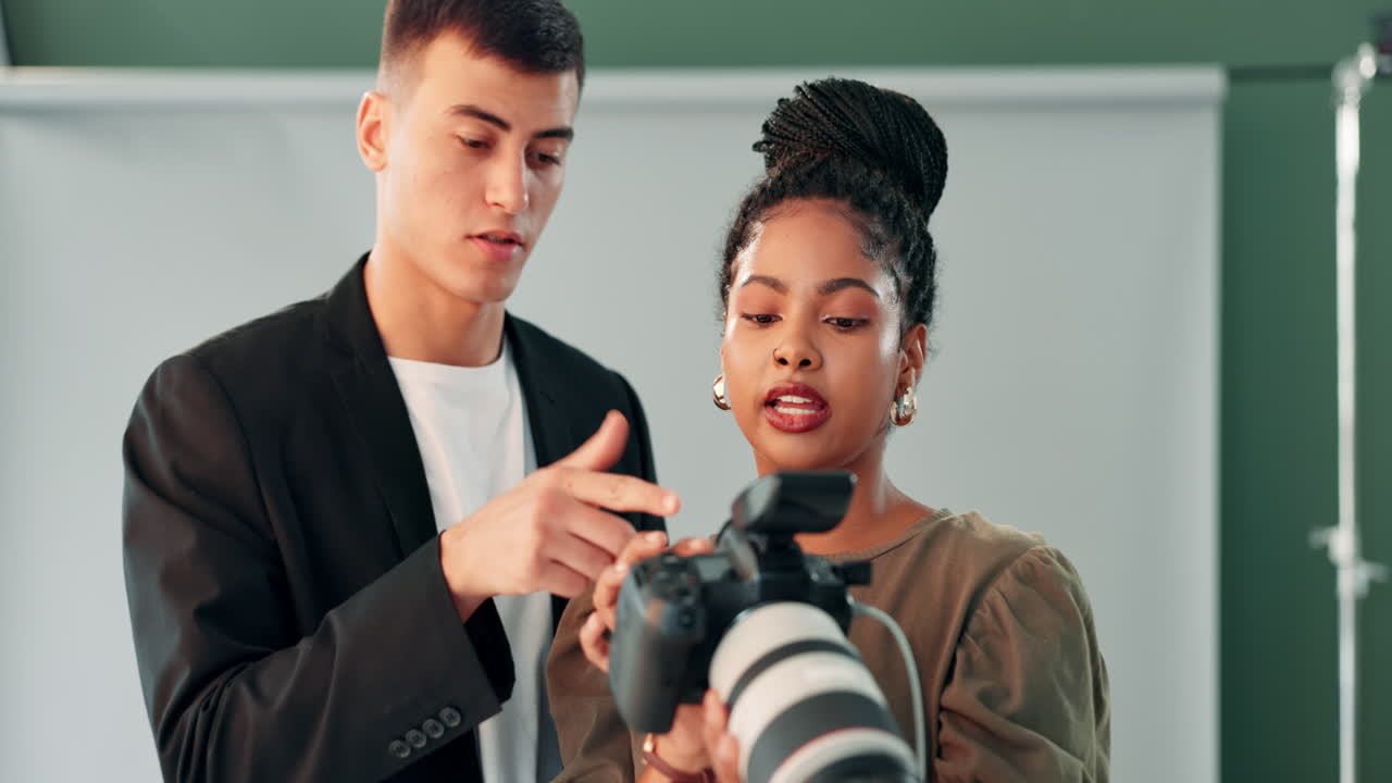 Photographers collaborating in a studio setting