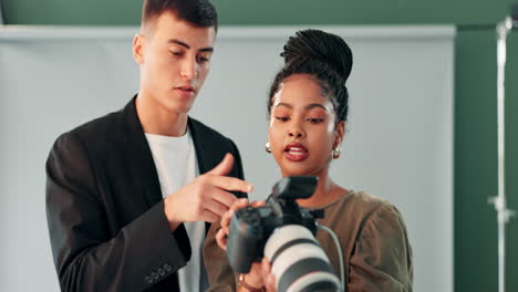 photographers collaborating in a studio setting
