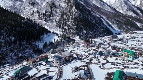 snowy mountain village aerial view