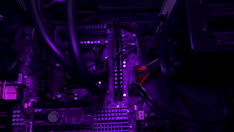 colorful lights shining on desktop computer motherboard