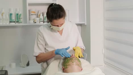 professional face care procedures in the modern cosmetology clinic. face mask applying