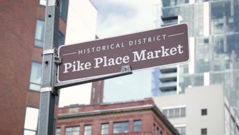 downtown seattle pikes place street sign slow motion