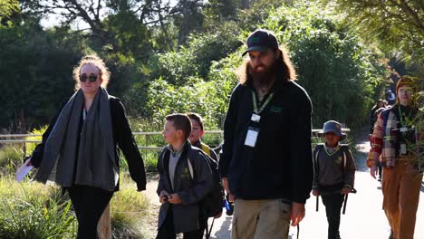 children and adults walking together at the zoo