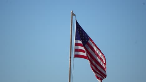 american flag waving in the wind