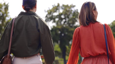 Nature,-walking-and-women-friends-in-conversation