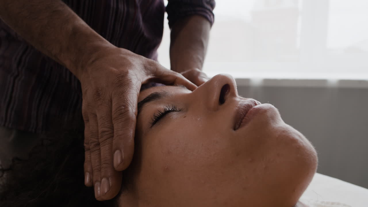 Woman receiving a face massage