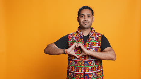 happy affectionate person doing tender love gesturing, studio background