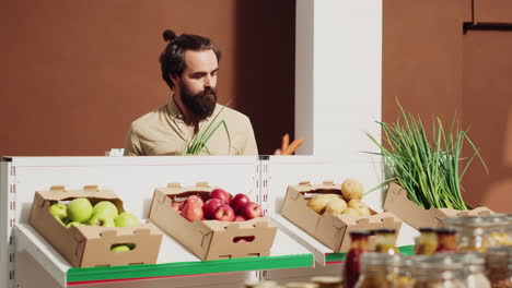 man shopping for organic vegetables