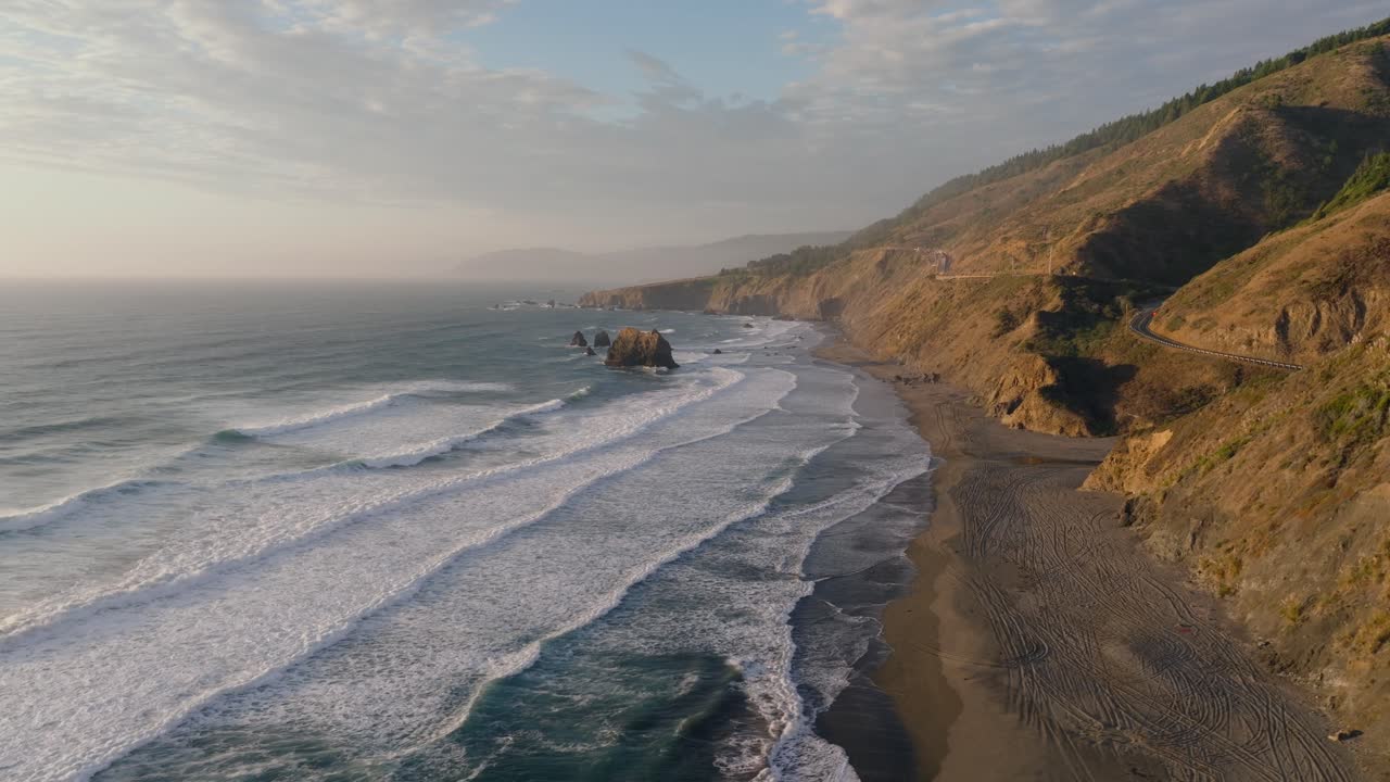 Scenic California coast waves at sunset, tranquil and breathtaking view