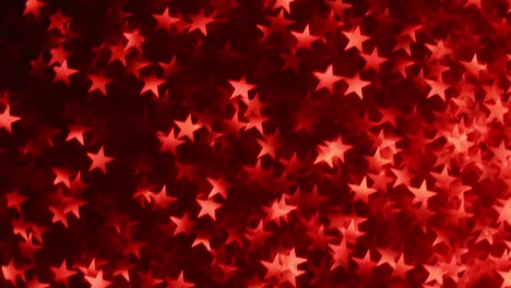 festivo fondo rojo borroso con estrellas.