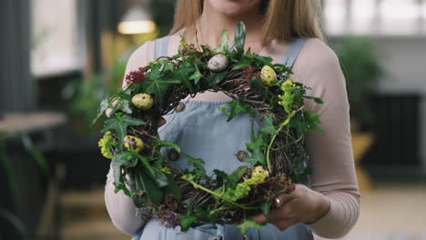 woman with easter flower wreaths