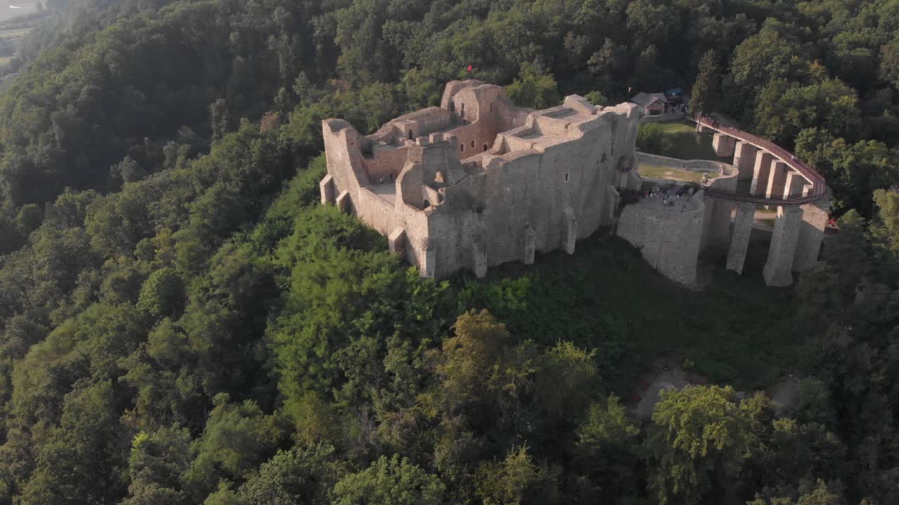 Cetatea Neamt. Neamt Citadel, Neamt County, Romania. Aerial Footage of medieval fortress surrounded by forest! Panoramic flight.
