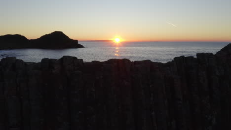 stunning sunset over coastal cliffs and ocean