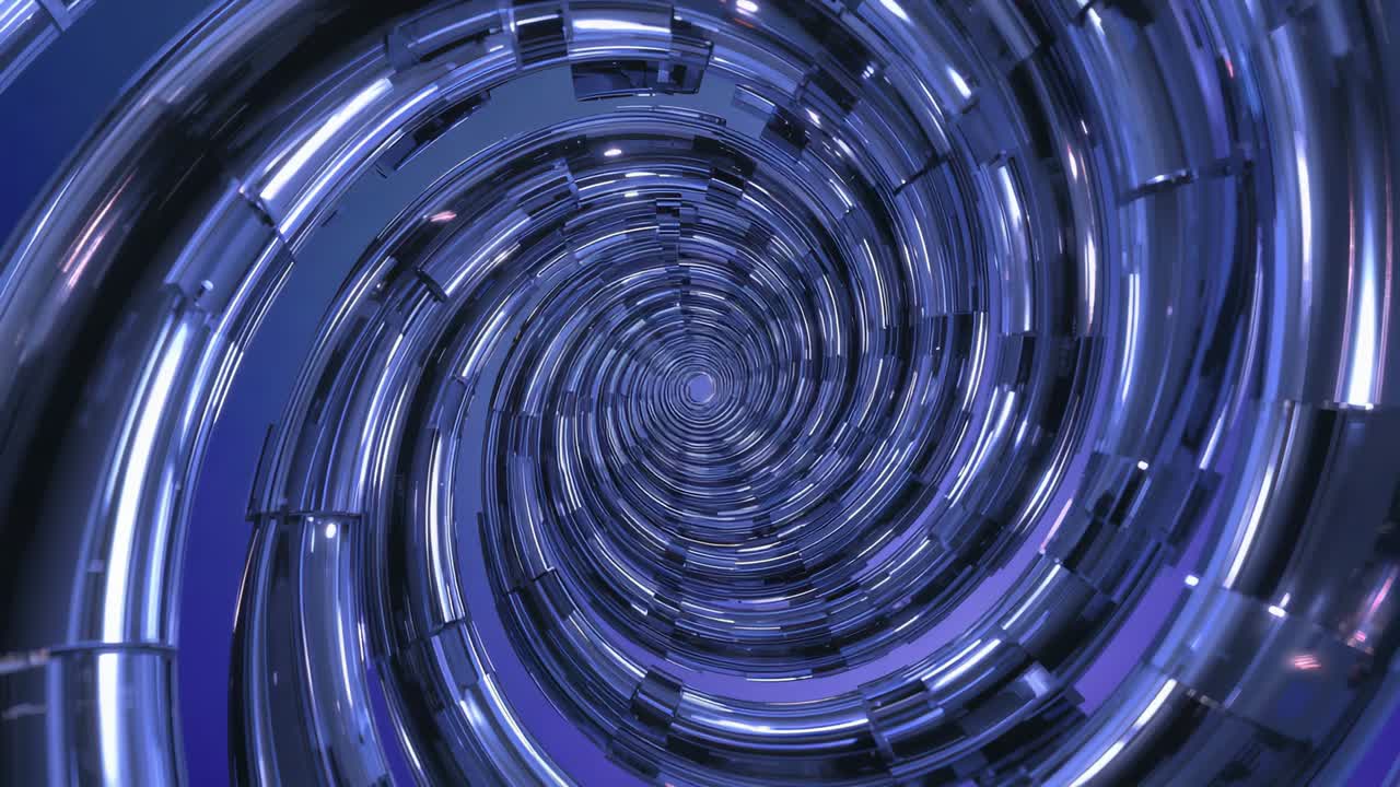 Playback starting, camera moving inward through reflective chrome segmented rings to reveal center