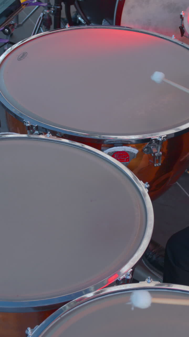 Close-up of Musician's Hands Playing Timpani Drums