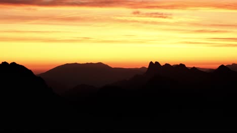 sunrise from 2300m on a summit of a mountain in the alps