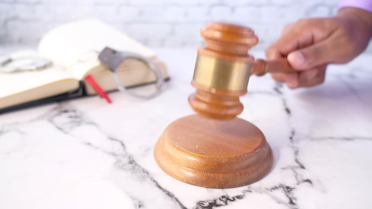 Courtroom Scene with Gavel and Handcuffs