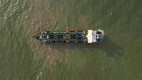 Top-view-of-a-large-container-ship-in-brazilian-ocean,-Itajai,-Santa-Catarina,-Brazil