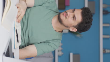 Vertical-video-of-Abandoned-male-student.