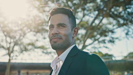 portrait of a man in a suit outdoors