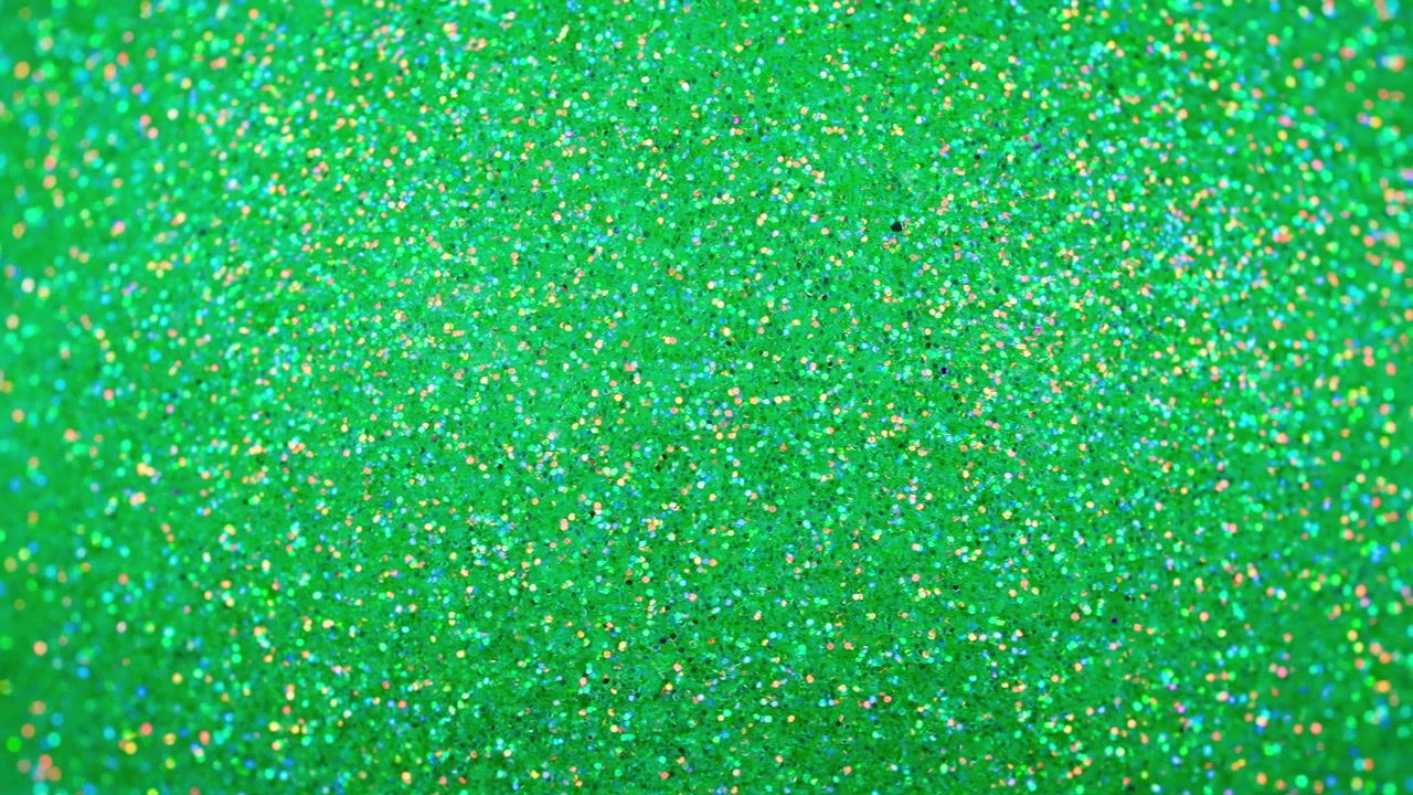 Vibrant Green Glitter Shimmering Abstract Background