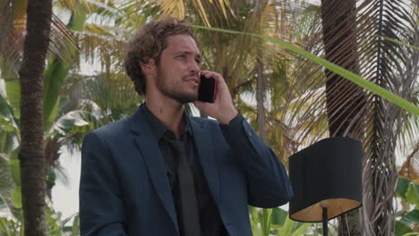businessman having phone call in bali