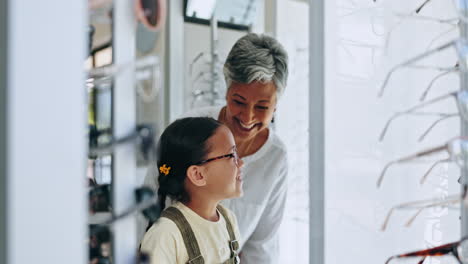 woman, child and eyewear shopping for eyecare