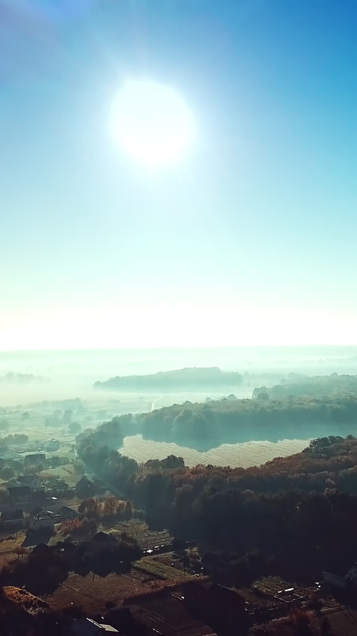Beautiful scenery landscape. Aerial view from above of small village Vertical video