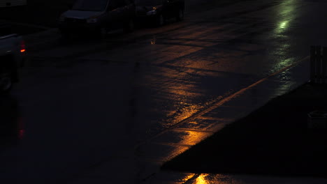 Truck-drives-on-wet-street-during-Rain-at-Night