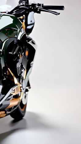 green motorcycle with gold accents in a sleek studio
