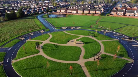 modern circular cemetery pathway design aerial view artistic garden of rest low orbit left