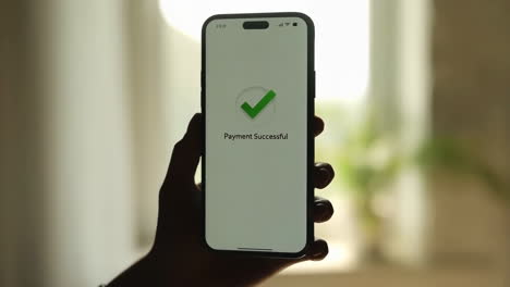 smartphone displaying 'payment successful' message