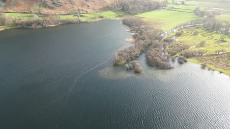 scenic lake of ullswater at sunrise in the lake district, england