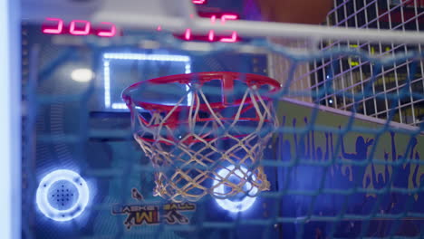 close-up view of a basketball arcade game