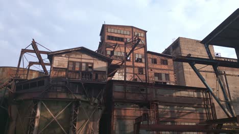 exploring an abandoned industrial complex: ruins of a forgotten factory