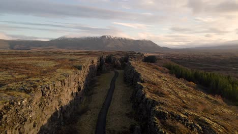 aerial forward ascending over canyon in thingvellir national park with breathtaking landscape