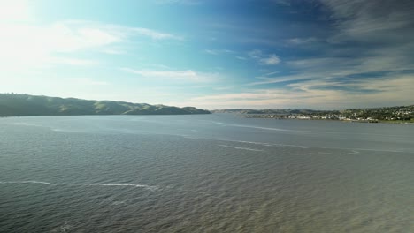 breathtaking aerial shots of the port costa area’s green hills paired with benicia’s vibrant cityscape and waterfront views, offering a unique look at northern california’s charm