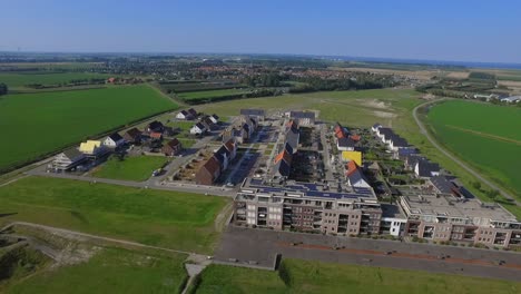 Aerial-shots-of-a-new-neighborhood-near-the-sea-in-Kruiningen,-the-Netherlands