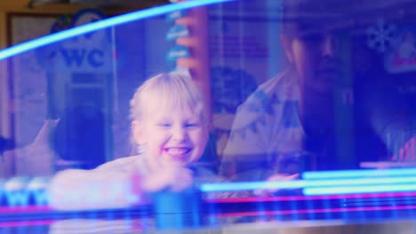 The-child-enthusiastically-plays-table-hockey-1