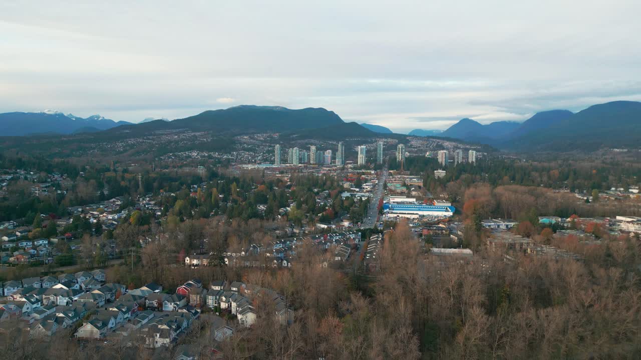 a beautiful autumn shot of port coquitlam with eagle mountain on the background.