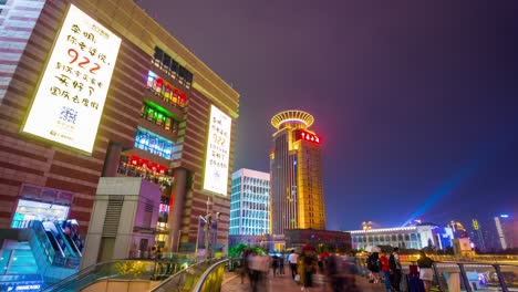 night illuminated shanghai famous mall bridge front view 4k time lapse china