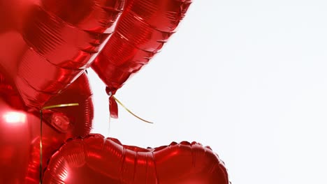 red balloons floating in the air 4k