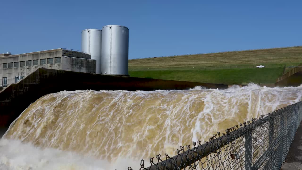 Static video of the Denison Dam on Lake Texoma releasing water. This was shot at the end of May, 2025 after several rain storms causing massive floodind on Lake Texoma.